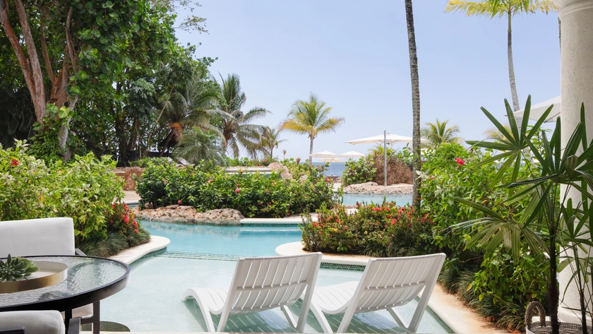 Sundowner Swim Up Beachfront Butler Suite Terrace and Pool Access