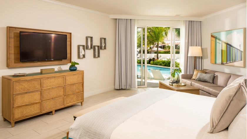 West Bay One Bedroom Swim-Up Butler Suite with Patio Tranquillity Soaking Tub Bedroom