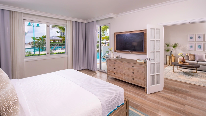 West Bay One Bedroom Oceanview Swim-Up Butler Suite with Patio Tranquillity Soaking Tub Bedroom 