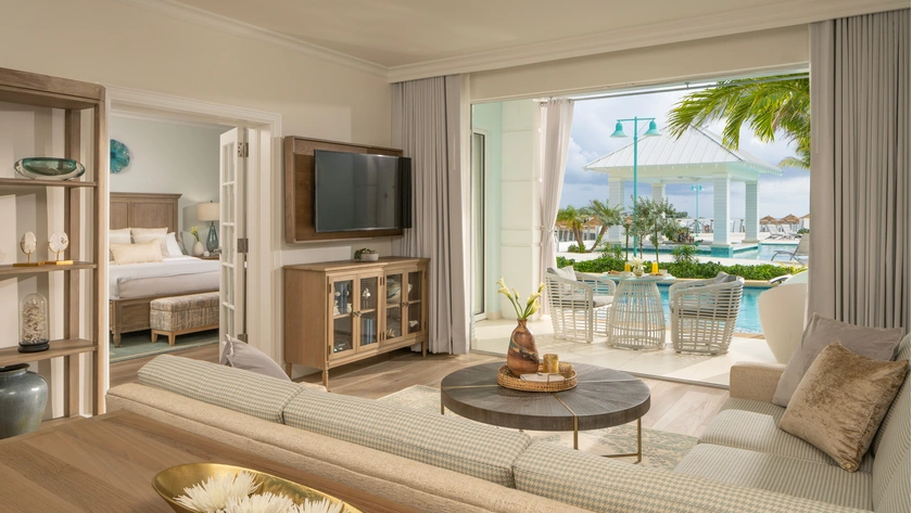 West Bay One Bedroom Oceanview Swim-Up Butler Suite with Patio Tranquillity Soaking Tub Living Room