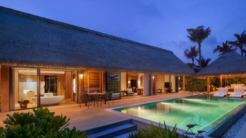 Grand Beach Villa with Pool at Dusk
